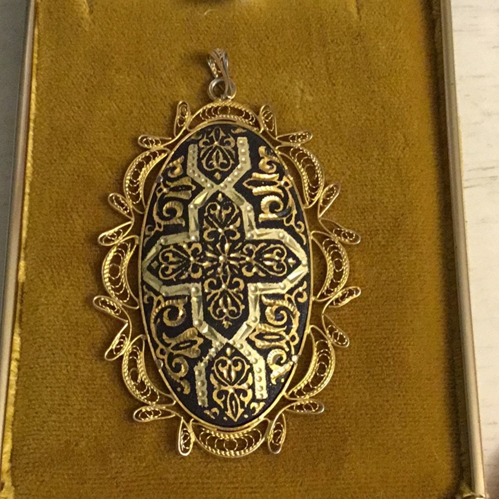 Vintage damascene pendant.